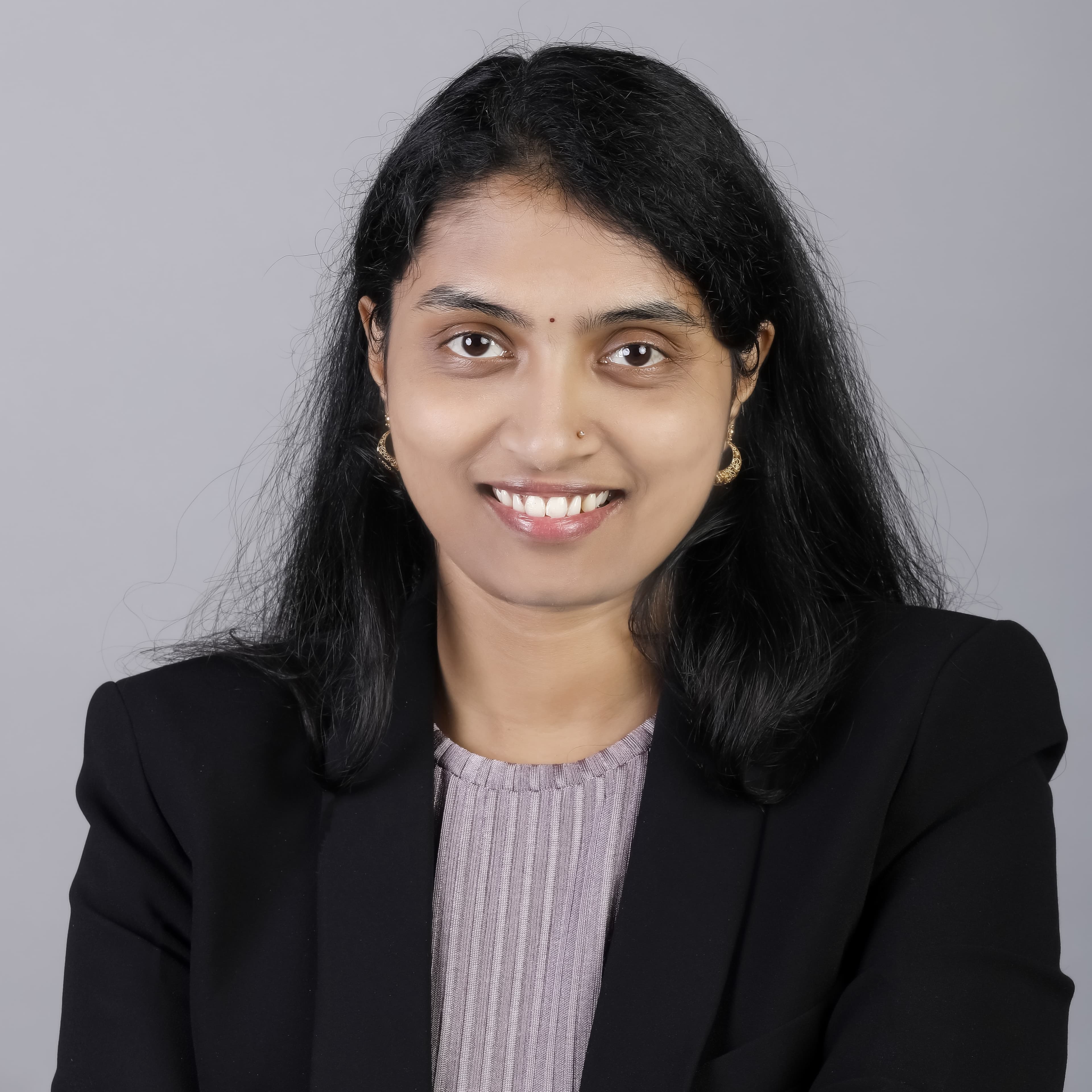 Dr. Nishmita R
